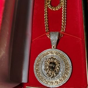 14k Italian gold franco chain with versace pendent